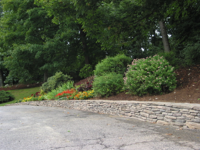 Retaining Wall along driveway - Hardscapes New Milford CT